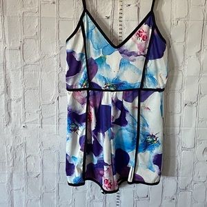Jumpsuit or Romper Multi print floral cool for the summer/ fall season Size M